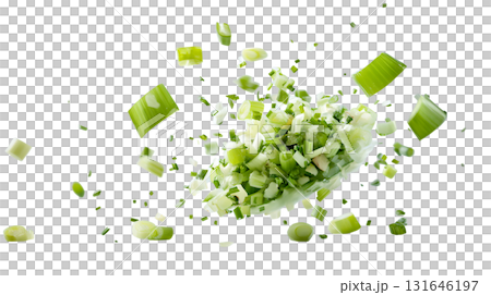Assortment of freshly chopped green vegetables including celery bell peppers and herbs scattered against a plain white background 131646197
