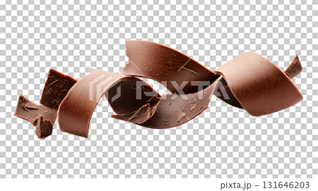 Close up of delicious shiny dark chocolate curls or shavings arranged on a plain white background showcasing the rich Close up of delicious shiny dark chocolate curls or shavings arranged on a plain white background showcasing the rich 131646203