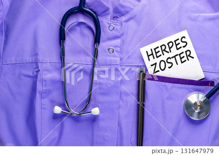 Herpes zoster symbol. Concept words Herpes zoster on beautiful white card. Stethoscope and pen. Beautiful medical uniform. Medical healthy lifestyle herpes zoster concept. 131647979