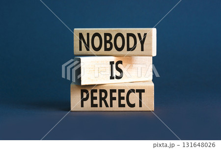 Nobody is perfect symbol. Concept words Nobody is perfect on beautiful wooden block. Beautiful grey table grey background. Business motivational lifestyle and nobody is perfect concept. Copy space. Nobody is perfect symbol. Concept words Nobody is perfect on beautiful wooden block. Beautiful grey table grey background. Business motivational lifestyle and nobody is perfect concept. Copy space. 131648026