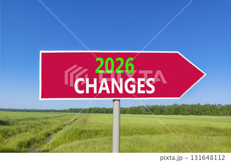 2026 Changes symbol. Concept words 2026 Changes on beautiful red road sign. Beautiful green grass field forest and blue sky background. Business and 2026 changes concept. Copy space. 131648112