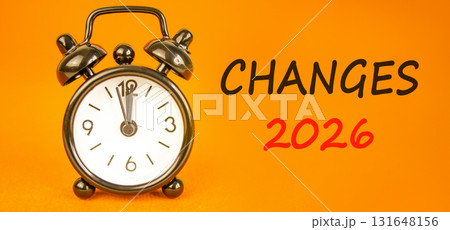 Changes 2026 symbol. Concept words Changes 2026 on beautiful orange paper. Beautiful orange paper background. Beautiful black alarm clock. Business and changes 2026 concept. Copy space. Changes 2026 symbol. Concept words Changes 2026 on beautiful orange paper. Beautiful orange paper background. Beautiful black alarm clock. Business and changes 2026 concept. Copy space. 131648156
