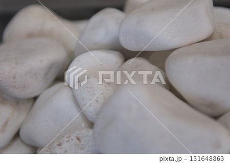 blue round stones on white background 131648863