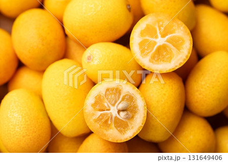 Fresh kumquats fruit texture background Fresh kumquats fruit texture background 131649406