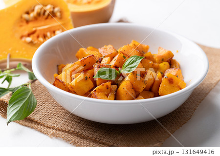 Roasted butternut squash pumpkin in a bowl, Autumn homemade food 131649416