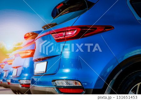 Blue Family business spotrs hatchback Car on sunset. Business success concept Blue Family business spotrs hatchback Car on sunset. Business success concept 131651453
