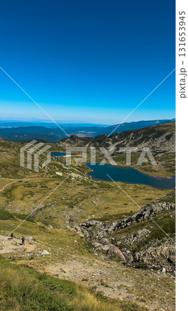 Mountain view of the Rila Mountains in Bulgaria. Seven Rila Lake hike. Eco trails. Connection with nature. Mountain view of the Rila Mountains in Bulgaria. Seven Rila Lake hike. Eco trails. Connection with nature. 131653945