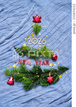New Year background with branches in the shape of a Christmas tree. 131654222