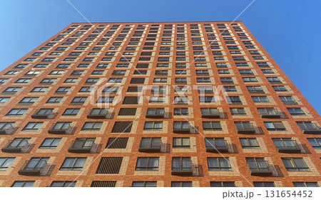 Architecture and real estate, modern residential apartment building with large panoramic windows Architecture and real estate, modern residential apartment building with large panoramic windows 131654452