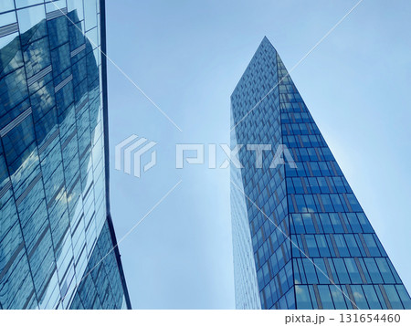 Office building. Glass skyscrapers in business center. Architecture, commercial real estate Office building. Glass skyscrapers in business center. Architecture, commercial real estate 131654460