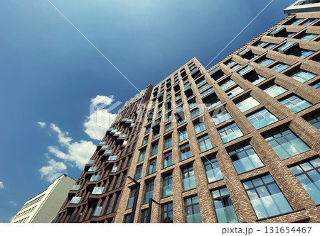Architecture and real estate, modern residential apartment building with large panoramic windows Architecture and real estate, modern residential apartment building with large panoramic windows 131654467