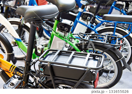 Lithium ion battery on bicycle luggage carrier 131655026