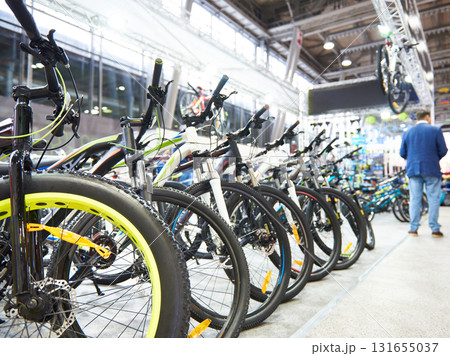 Modern mountain bikes in sports shop Modern mountain bikes in sports shop 131655037