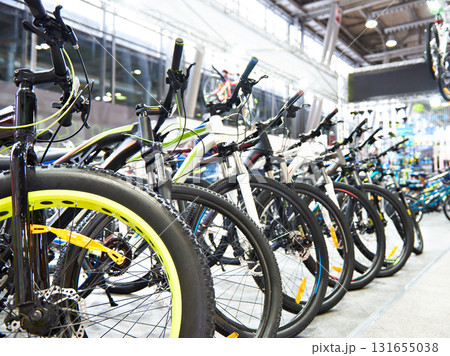 Modern mountain bikes in sports shop 131655038