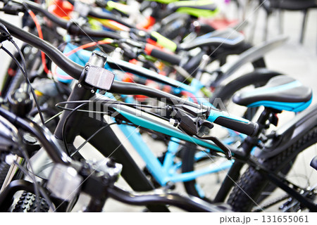 Modern mountain bikes in sports shop Modern mountain bikes in sports shop 131655061