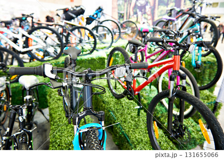 Modern mountain bikes in sports shop Modern mountain bikes in sports shop 131655066
