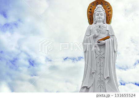 The Guanyin statue on Hainan Island, China. A majestic Buddhist monument by the sea The Guanyin statue on Hainan Island, China. A majestic Buddhist monument by the sea 131655524