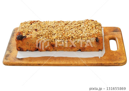 Rustic traditional bakery. Whole grain homemade bread on a rustic wooden board. Rustic traditional bakery. Whole grain homemade bread on a rustic wooden board. 131655869