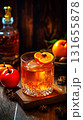 Cozy Winter Old Fashioned with Fresh Persimmon 131655878