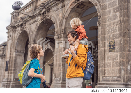 Father with his two sons visiting Chapultepec Castle in Mexico City, enjoying a cultural family trip together. Tourism, heritage exploration, and family bonding vacation concept 131655961