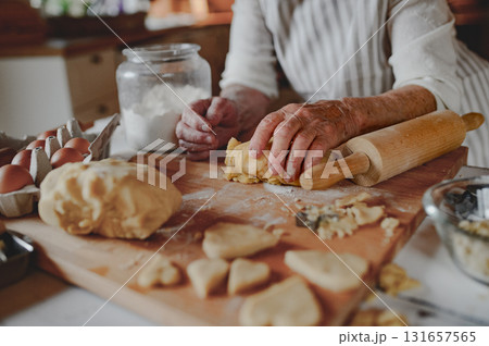 Senior woman's hands preparing homemade cookies. 131657565