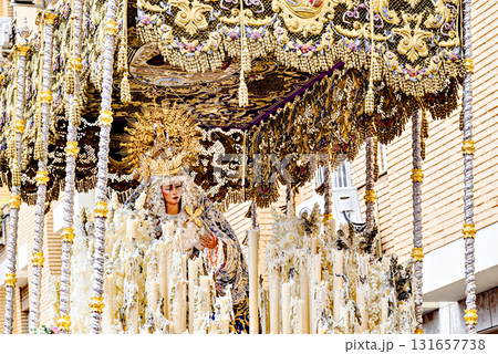 The Virgin of Health procession in the Holy Week procession in Seville, Andalusia, Spain The Virgin of Health procession in the Holy Week procession in Seville, Andalusia, Spain 131657738