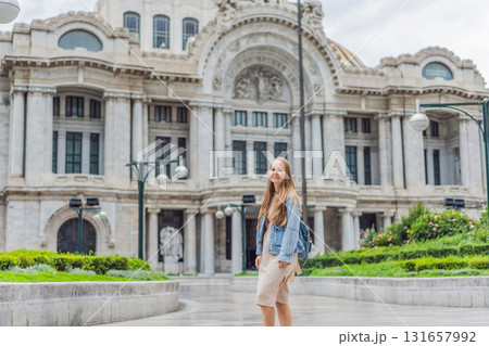Woman tourist standing in front of Palacio de Bellas Artes in Mexico City, capturing the beauty of Mexican culture, architecture, and iconic travel landmarks Woman tourist standing in front of Palacio de Bellas Artes in Mexico City, capturing the beauty of Mexican culture, architecture, and iconic travel landmarks 131657992