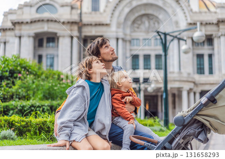 Father tourist with his two sons in front of Palacio de Bellas Artes in Mexico City, enjoying family vacation, cultural exploration, and architecture. Family travel and bonding concept 131658293