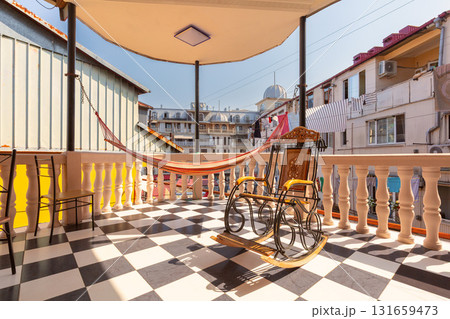 Veranda with hammock and chair in Batumi Georgia 131659473