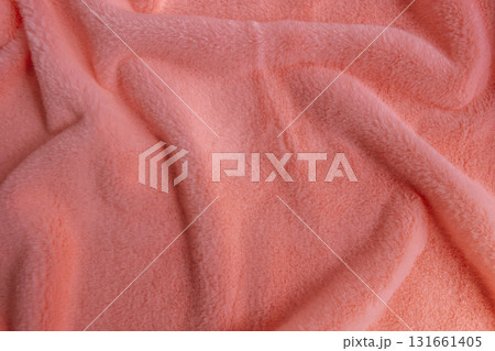 soft pink artificial fur with gentle texture spread across surface. closeup. soft pink artificial fur with gentle texture spread across surface. closeup. 131661405