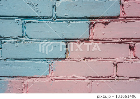 rough texture wall with pastel finish in blue and pink tones. closeup. 131661406
