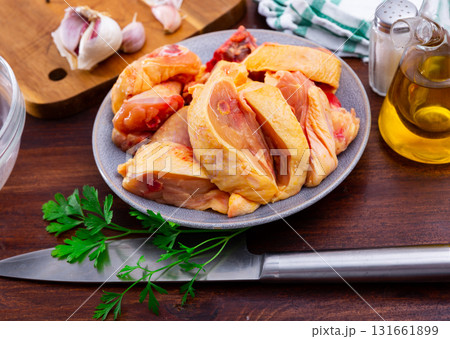 Bowl with raw sliced chicken, food preparation Bowl with raw sliced chicken, food preparation 131661899