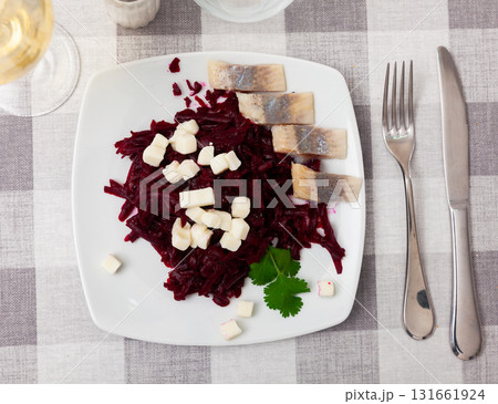 Beetroot served with cheese and pickled mackerel 131661924