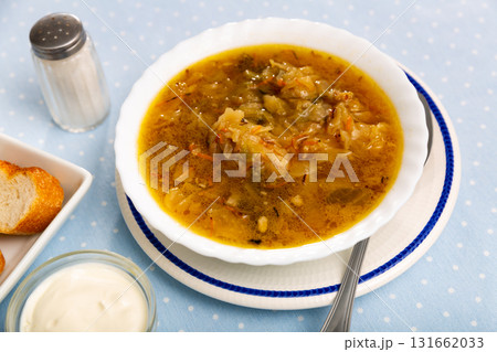 Traditional Russian dish is cabbage soup 131662033