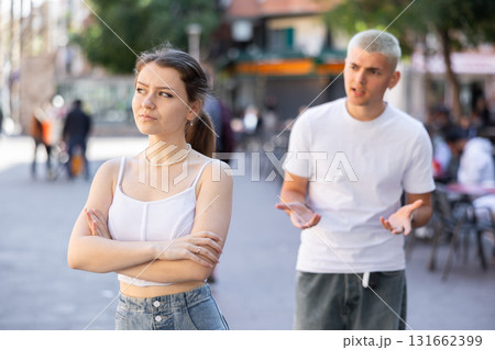 guy and his girlfriend quarreled on the street 131662399