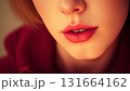 Cinematic image of beautiful woman with red lipstick on her lips, in retro style 131664162