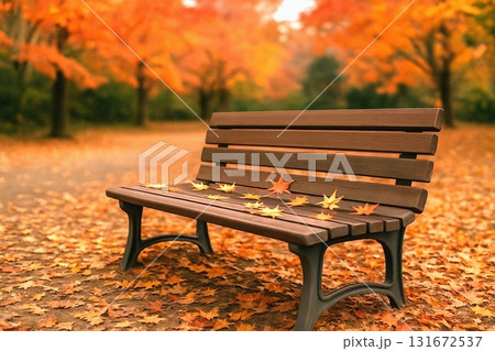 秋の公園ベンチと紅葉の風景　落ち葉のある静かな背景素材 131672537
