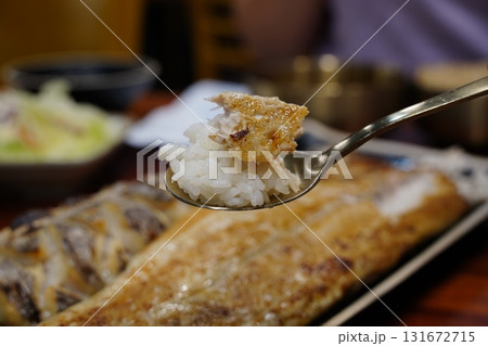 Korean Grilled Hairtail Fish (Galchi) Served on White Rice Korean Grilled Hairtail Fish (Galchi) Served on White Rice 131672715