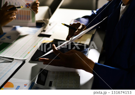 business people in meeting discussing plans together business people in meeting discussing plans together 131674153