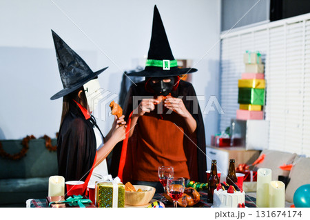 People having fun at Halloween party People having fun at Halloween party 131674174