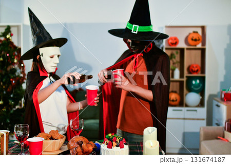People having fun at Halloween party People having fun at Halloween party 131674187