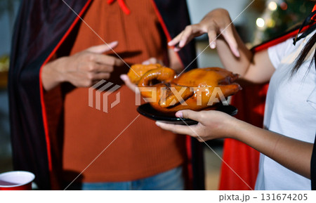 People having fun at Halloween party People having fun at Halloween party 131674205