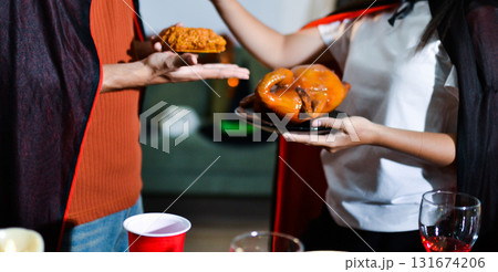 People having fun at Halloween party People having fun at Halloween party 131674206