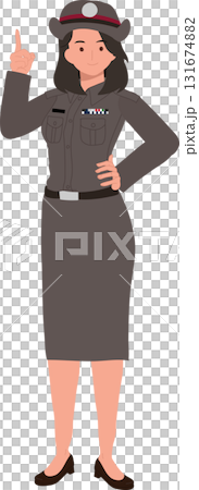 thai female police officer in uniform standing and pointing upward for public awareness or education concept 131674882