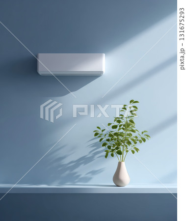Minimalist home interior with an air conditioner on blue wall. Sunlight creates peaceful shadow over green plant in vase, conveying calm and tranquil feeling Minimalist home interior with an air conditioner on blue wall. Sunlight creates peaceful shadow over green plant in vase, conveying calm and tranquil feeling 131675293