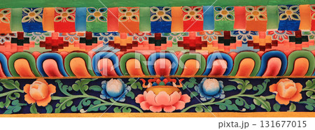 Colorful detail of monastry facade in Shyapru Bensi, Nepal. Beautiful painted fresko of a monastery in the Langtang Valley, Nepal. 131677015