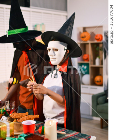 People having fun at Halloween party 131677604