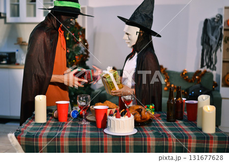 People having fun at Halloween party People having fun at Halloween party 131677628