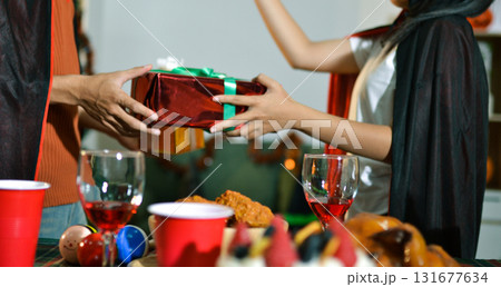 People having fun at Halloween party People having fun at Halloween party 131677634