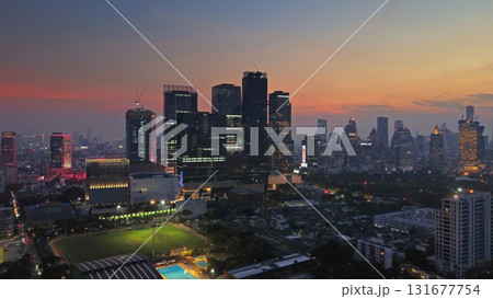 Illuminated skyscrapers and Lumpini park in Bangkok Illuminated skyscrapers and Lumpini park in Bangkok 131677754